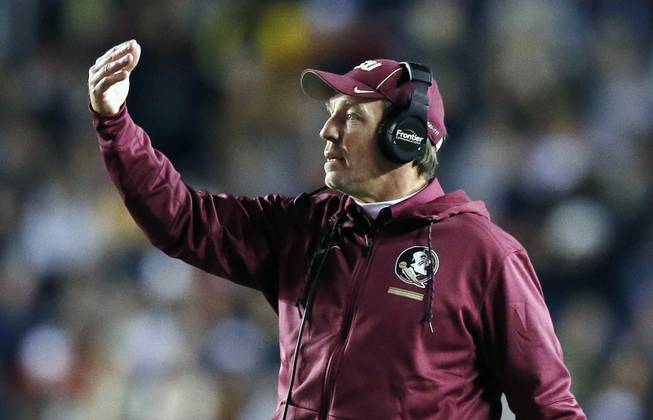 Florida State head coach Jimbo Fisher gives instructions to his team during the first half of an NCAA college football game against Boston College in Boston, Friday, Oct. 27, 2017. Boston College won 35-3. 