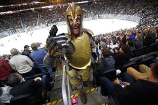A man dressed as a Golden Knight is shown at T-Mobile Arena Sunday, Nov. 19, 2017.
