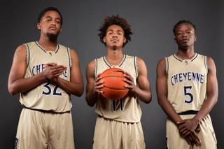 Players of the Cheyenne High basketball team, from left, Damion Bonty, Keshawn Hall and Kavon Williams, take a portrait during the Las Vegas Sun's Media Day at the South Point on Nov. 14, 2017.