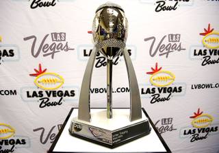 John Saccenti, executive director of the Las Vegas Bowl, announces the matchup of Las Vegas Bowl XXVI during a news conference Sunday, December 3, 2017.
