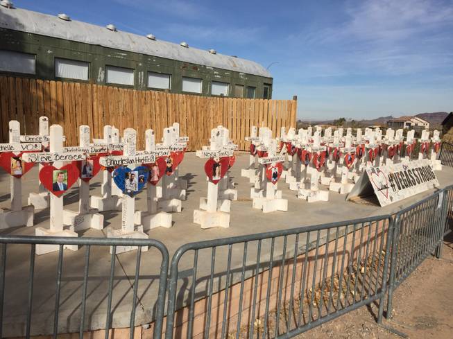 The wooden crosses honoring the 58 victims of the mass shooting on the Las Vegas Strip are displayed at the Clark County Museum.