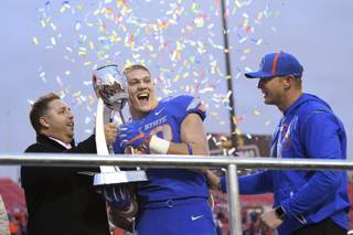 Boise State Broncos linebacker Leighton Vander Esch (38) celebrates their win over Oregon in the Las Vegas Bowl Saturday, December 16, 2017, at Sam Boyd Stadium. Boise State clinched their fourth Las Vegas Bowl with a 38-28 win.