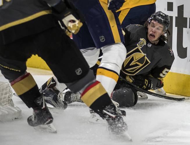 Vegas Golden Knights left wing Erik Haula (56) looks to avoid being stepped on while on the ice versus Nashville during their game at the T-Mobile Arena on Tuesday, Jan. 2, 2018.