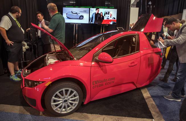 Electra Meccanica features their new Solo electric car they tout as "The Smartest Commuter Car on the Planet" as CES takes over the Las Vegas Convention Center on Tuesday, Jan. 9, 2018.