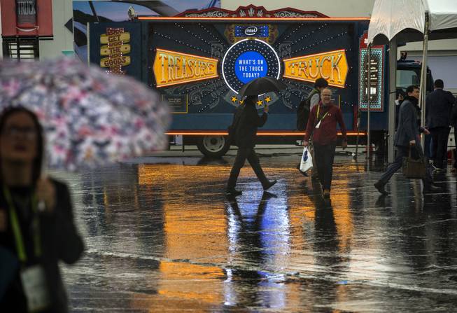 Rain unfortunately keeps the crowds away from the parking lot exhibits as CES takes over the Las Vegas Convention Center on Tuesday, Jan. 9, 2018.