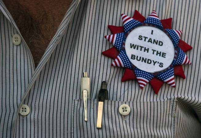 A Cliven Bundy supporter wears a badge of support during a press conference in front of Metro Police Headquarters on Wednesday, Jan. 10, 2018.