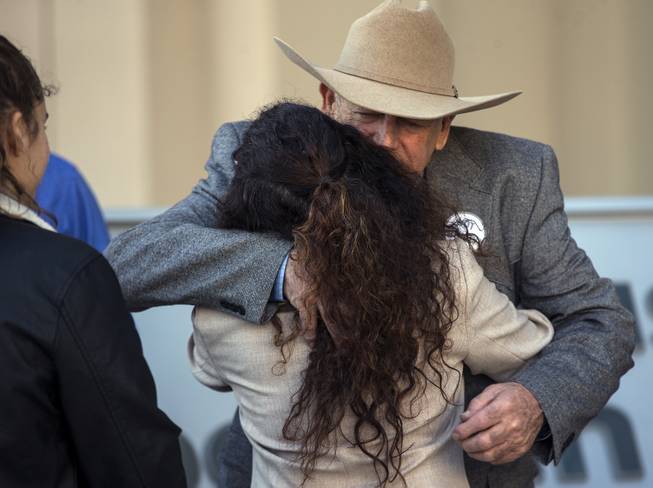 Cliven Bundy shares a hug with a supporter there for his press conference in front of Metro Police Headquarters on Wednesday, Jan. 10, 2018.