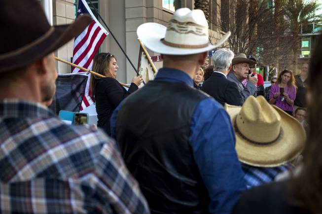 Attorney Larry Layman stands by client Cliven Bundy as he holds a press conference in front of Metro Police Headquarters on Wednesday, Jan. 10, 2018.