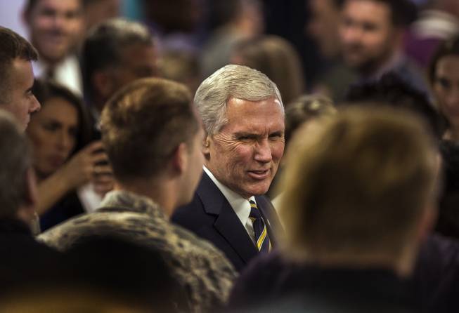 Vice President Mike Pence chats with members of the military during the grand opening of AFWERX Vegas on Thursday, Jan. 11, 2018.