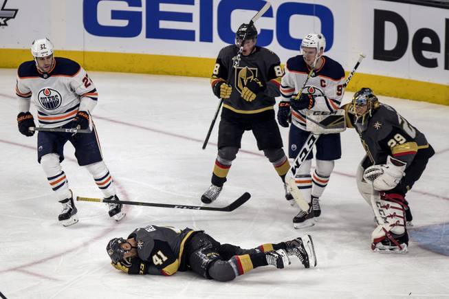 Vegas Golden Knights left wing Pierre-Edouard Bellemare (41) is temporarily injured after taking a direct shot from a puck close in during their game versus the Edmonton Oiler at the T-Mobile Arena on Saturday, Jan. 13, 2018.