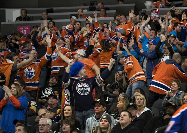 Edmonton Oilers fans celebrate their overtime win over the Vegas Golden Knights during their game at the T-Mobile Arena on Saturday, Jan. 13, 2018.