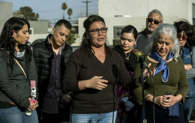 Sheyla Padilla, daughter of Celia Luna, is joined by family members while addressing the media during a plea for information related to her mother's recent homicide at the Express Cash Checking on Jones Boulevard near Vegas Drive on Thursday, Jan. 18, 2018.