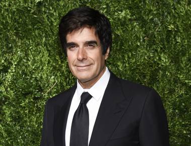 The tricks behind a disappearing act that magician David Copperfield performed for years in Las Vegas were revealed in court Friday, the first day of trial in a civil case brought by a British ...