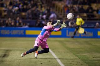 Lights goalkeeper stops the ball during the Lights spring training match against the Vancouver Whitecaps Saturday, February 17, 2018 at Cashman Field.