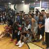 The Canyon Springs High basketball team takes a picture with the Sunrise Regional championship trophy following its title game victory against Coronado on Feb. 17, 2018.