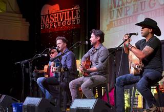 From left, singer-songwriters Phillip White, Aaron Benward, Travis Howard, and Coffey Anderson perform during Nashville Unplugged in the Rhythm & Riffs lounge at Mandalay Bay Friday, March 2, 2018.