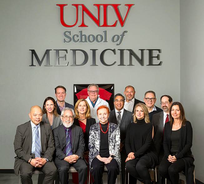 UNLV School of Medicine Dean Barbara Atkinson, center, is shown with supporters March 21, 2018, at the medical school.
