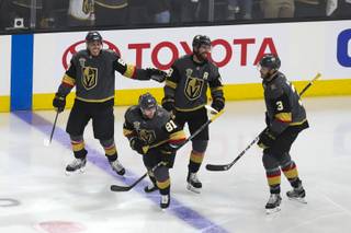 The Vegas Golden Knights celebrate after scoring during the first period of Game 3 in an NHL Western Conference Finals at T-Mobile Arena, Wednesday, May 16, 2018. WADE VANDERVORT