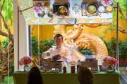 Chef Alan Ji demonstrates how to cook a signature three cup sea bass for guests during a Master Class at Wing Lei, Wynn, Friday June 15, 2018.