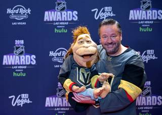 Duggie Scott Walker, left, and entertainer Terry Fator arrive for the 2018 NHL Awards show at the Hard Rock Wednesday, June 20, 2018.
