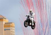 Travis Pastrana jumps 52 crushed cars in a lot east of Planet Hollywood Sunday, July 8, 2018. Pastrana recreated three of Evel Knievel's iconic motorcycle jumps on Sunday, including the Dec. 31, 1967 leap over the fountains of Caesars Palace that left Knievel badly injured. Knievel's 50-stacked-car jump, which Knievel landed, took place at the Los Angeles Memorial Coliseum in February of 1973.