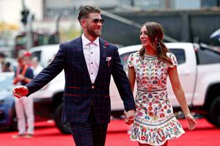 Las Vegas native Bryce Harper, sporting a Stitched suit,  and his wife, Kayla, walk the red carpet at the MLB All-Star game on July 17, 2018, in Washington, D.C.