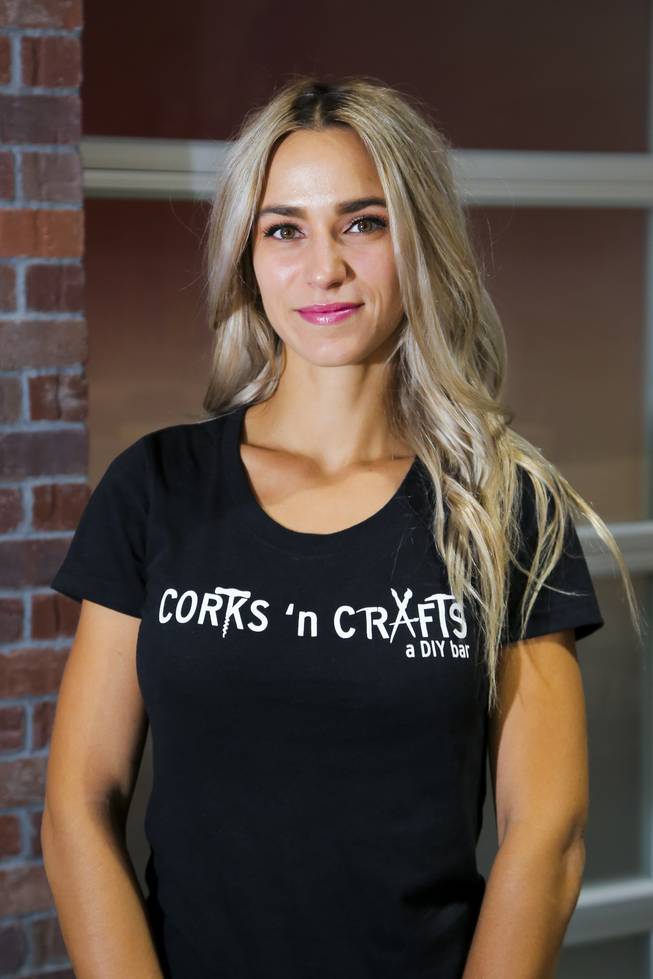 Corks 'n Crafts owner Alainah Paul poses for a photo.