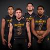 Members of the Durango High football team pose for a photo at the Las Vegas Sun's high school football media day Tuesday July 31, 2018 at the Red Rock Resort and Casino. They include, from left, Frankie Pelton, Kaden Renshaw, Jayden Nersinger and TK Fotu.