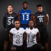 Members of the Desert Pines High football team pose for a photo at the Las Vegas Sun's high school football media day Tuesday July 31, 2018 at the Red Rock Resort and Casino. They include, top row, Gabriel Lopez, Darnell Washington, Dejon Pratt. Bottom row, Tye Moore and Devin McGee