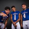 Members of the Liberty High football team pose for a photo at the Las Vegas Sun's high school football media day Tuesday July 31, 2018, at the Red Rock Resort. They include, from left, Troy Fautanu, Cervontes White and Kyle Beaudry.