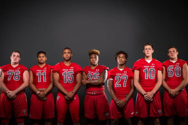 Members of the Arbor View High football team pose for a photo at the Las Vegas Sun's high school football media day Tuesday July 31, 2018 at the Red Rock Resort and Casino. They include, from left, Matt Smith, JJ Tuinei, Billy Davis, Kyle Graham, Niles Scafati, Login Bollinger and Lyle Santos.
