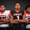 Members of the Chaparral High football team pose for a photo at the Las Vegas Sun's high school football media day Tuesday July 31, 2018 at the Red Rock Resort and Casino. They include, from left, Tomas Benitez, Joe Tauiliili and Jesus Casamayor.