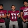 Members of the Desert Oasis High football team pose for a photo at the Las Vegas Sun's high school football media day Tuesday July 31, 2018 at the Red Rock Resort and Casino. They include, from left, Alvin Pomare, Laakea Mulivai and Brandon Cuevas.