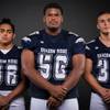Members of the Shadow Ridge High football team pose for a photo at the Las Vegas Sun's high school football media day Tuesday July 31, 2018 at the Red Rock Resort and Casino. They include, from left, Xavier Gomez, Ahmad Morris and Kody Presser.
