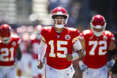 Kansas City Chiefs quarterback Patrick Mahomes runs onto the field before an NFL football game against the Los Angeles Chargers Sunday, Sept. 9, 2018, in Carson, Calif.