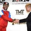 Floyd Mayweather, left, of the U.S. shakes hands with Japanese kickboxer Tenshin Nasukawa during a press conference in Tokyo, Monday, Nov. 5, 2018. Mayweather said he has signed to fight Nasukawa for a bout promoted by Japan's RIZIN Fighting Federation on Dec. 31 in Saitama, north of Tokyo.