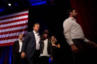 Sen. Dean Heller leaves the South Point stage with his family after conceding to Democrat Jacky Rosen, Tuesday, Nov. 6, 2018.