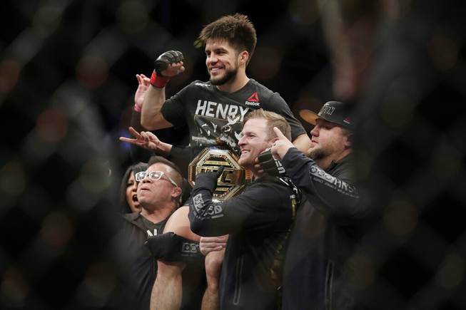 Henry Cejudo celebrates after a flyweight mixed martial arts championship bout against TJ Dillashaw at UFC Fight Night early Sunday, Jan. 20, 2019, in New York. Cejudo stopped Dillashaw in the first round. 

