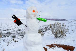A snowman is seen at the Red Rock Canyon National Conservation Area overlook Thursday, February 21, 2019.