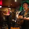 David Browne, left, and Dave Rooney of The Black Donnellys perform a set at Ri Ra Irish Pub at the Shoppes at Mandalay Place on Thursday, May 2, 2019. 