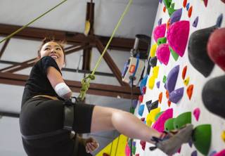 Cassie Schneider climbs during an adaptive recreation meetup at Origin Climbing & Fitness in Henderson, Nev., on Sunday, June 23, 2019.