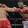 In this Nov. 18, 1995, file photo, WBC welterweight champion Pernell "Sweet Pea" Whitaker, right, delivers a right to the head of challenger Jake Rodriguez during their scheduled 12 round bout in Atlantic City, N.J.