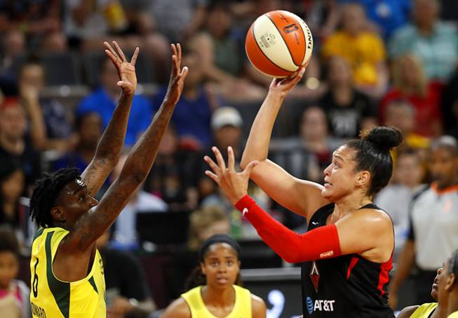Las Vegas Aces guard Kayla McBride (21) puts up the ball during a WNBA basketball game at the Mandalay Bay Events Center Tuesday, July 23, 2019.