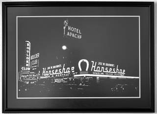 A 1952 photo shows the Hotel Apache sign above the Horseshoe in downtown Las Vegas Wednesday, July 24, 2019. On Monday, July 29, TLC Casino Enterprises will open 81 historically-themed rooms as Hotel Apache, the original name of the hotel when it was built in 1932.