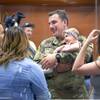 Brenden Tucker shows off his daughter Aurora, 6 months, following a mobilization ceremony for the Nevada Army Guard 3665th Explosive Ordnance Disposal Company at Las Vegas Readiness Center Tuesday, Aug. 20, 2019. 