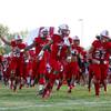 Liberty High School players take the field for a game against Chandler (Ariz.) High School in Henderson Friday, Aug. 23, 2019.