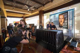 Tilman Fertitta, chairman, CEO, and owner of Landry's, Inc. and owner of NBA's Houston Rockets, autographs books and poses for photos during a book signing event at the Golden Nugget Saturday, Sept. 28, 2019. Fertitta''s book is 