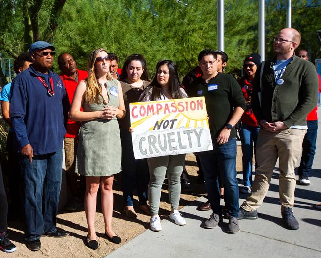 Emily Paulson, executive director of Nevada Homeless Alliance, second from left, speaks during a protest in response to a proposed city ordinance outside of Las Vegas City Hall on Wednesday, Oct. 2, 2019. The proposed ordinance would make homeless encampments illegal if beds are available through the city or nonprofit organizations. Miranda Alam/Special to the Sun