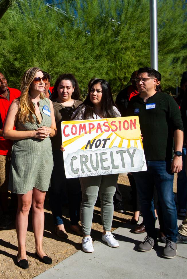Emily Paulson, executive director of Nevada Homeless Alliance, left, speaks during a protest in response to a proposed city ordinance outside of Las Vegas City Hall on Wednesday, Oct. 2, 2019. The proposed ordinance would make homeless encampments illegal if beds are available through the city or nonprofit organizations. Miranda Alam/Special to the Sun