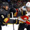 Vegas Golden Knights defenseman Brayden McNabb (3) gets mixed up with Calgary Flames center Sean Monahan (23) during the second period of a game at T-Mobile Arena Saturday, Oct. 12, 2019.